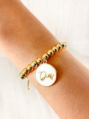 Pulsera con Dije Blanco de Dios - Balines Dorados
